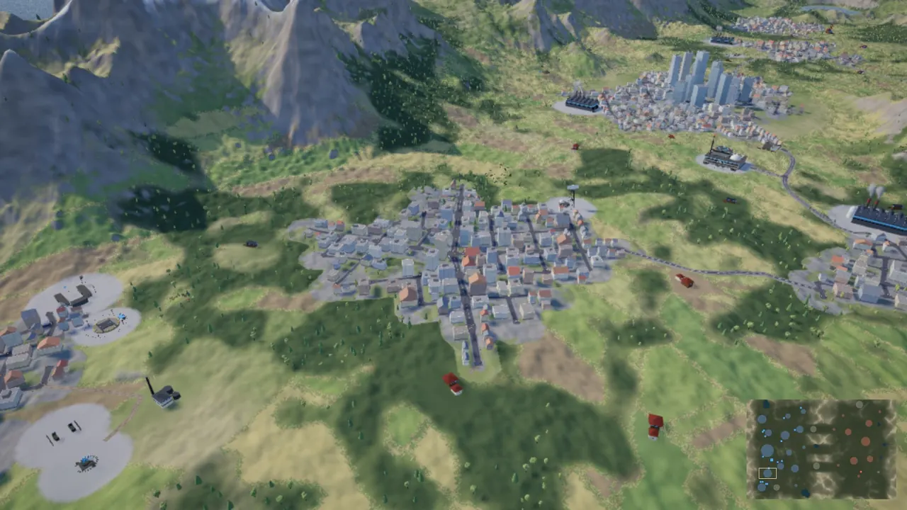 A town in the hills, its roads, its factory and the towers of the capital behind.